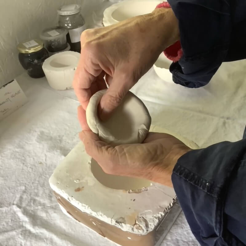 Moulding the clay