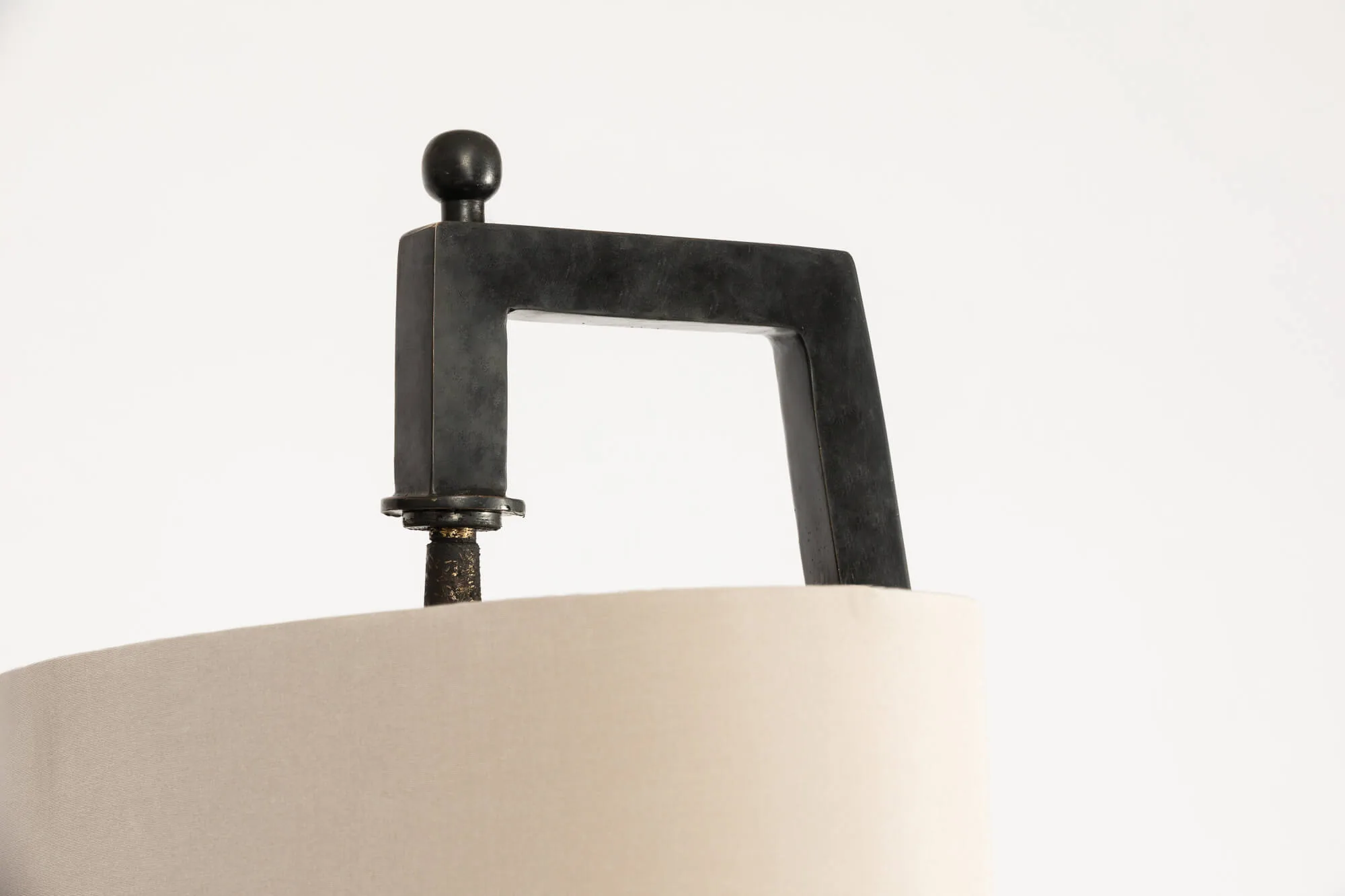 Angle Floor Lamp Bronze Nera — An illuminated table or floor lamp will always add soft pools of lighting.