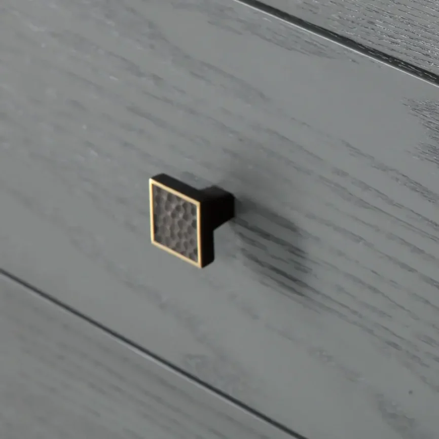 Astoria 6 Drawer Chest Graphite Grey — The black handles with a touch of gold are a standout feature, adding a subtle yet…
