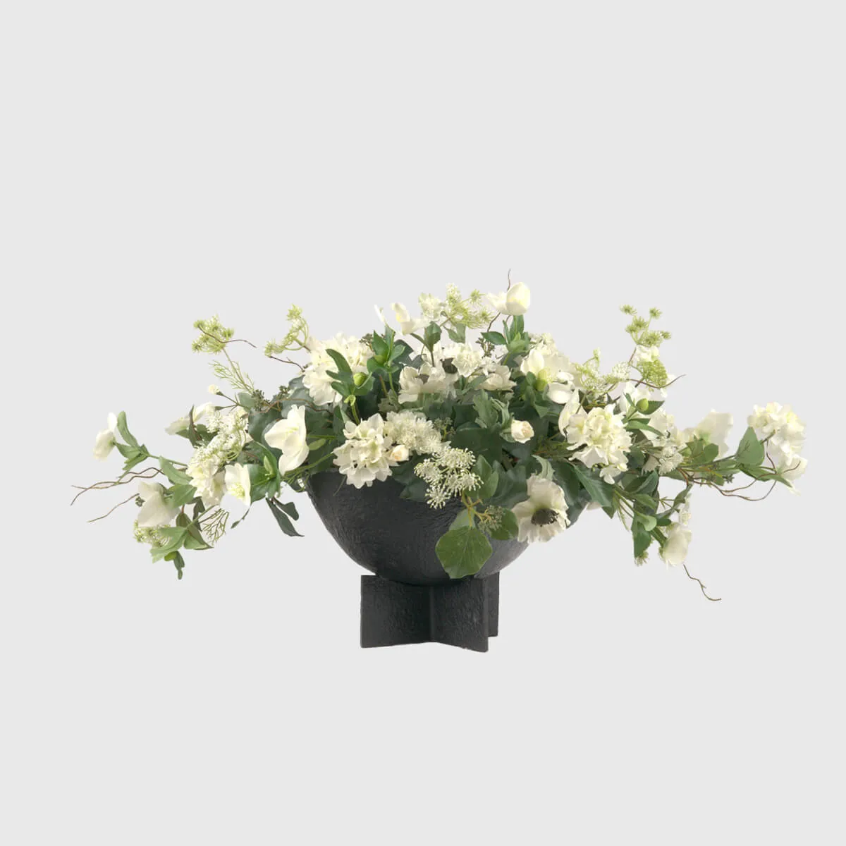 Bronze Brutalist Flower Bowl — The uneven, tactile finish not only enhances its visual depth but also reflects light in a…