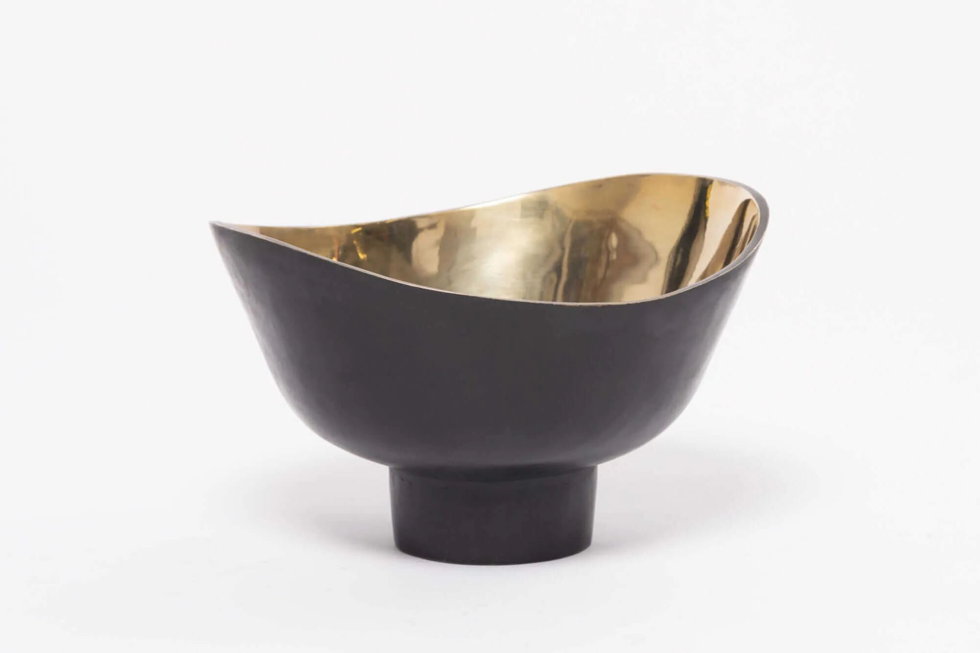 Bronze Curve Bowl — This bronze collection is not a pale imitation from inferior metals, but created by a process used for…