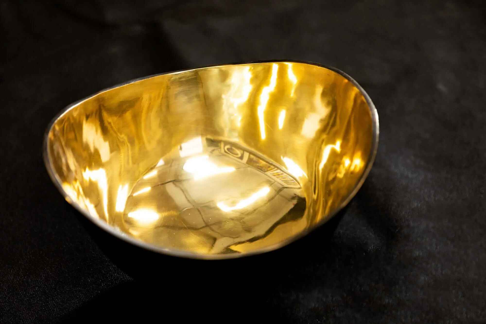 Bronze Curve Bowl — The technique is called lost wax casting.