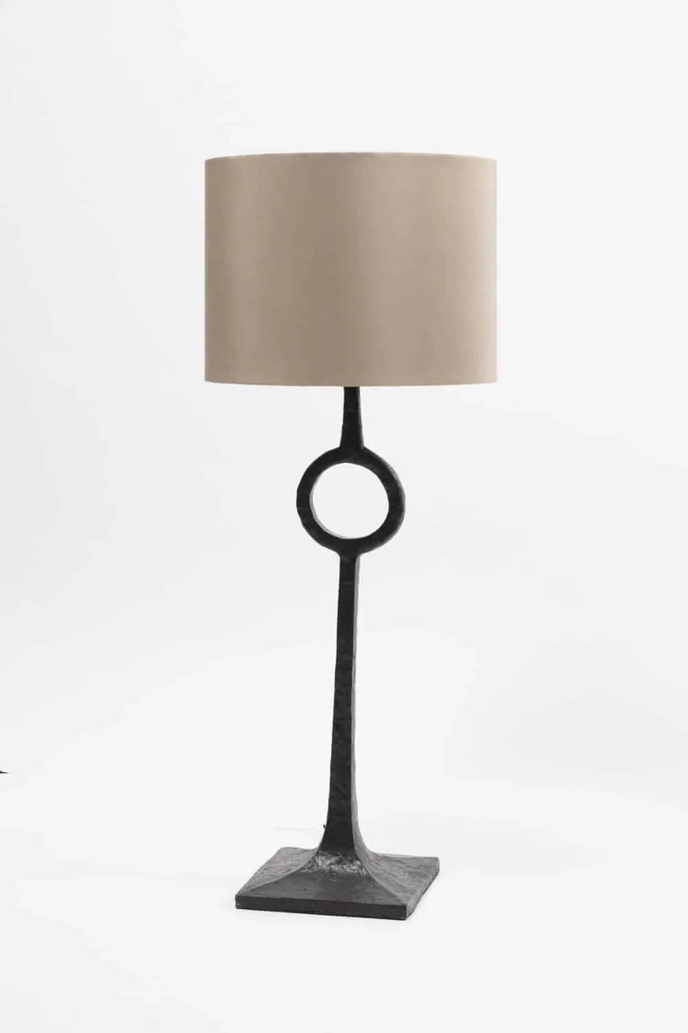 Bronze Ring Table Lamp — An illuminated table or floor lamp will always add soft pools of lighting.