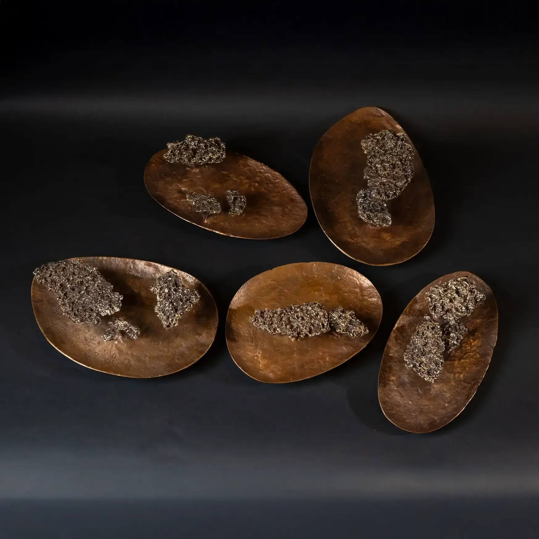 Bronze Savannah Plate — Handcrafted in solid bronze by Eccotrading Design London, this sculptural plate features an organic…