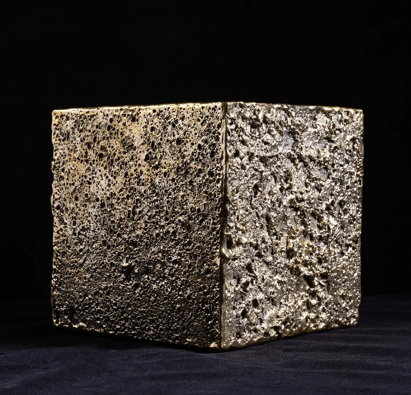 Bronze Sculpture Rain Cube — This exclusive bronze sculpture captures the essence of rainfall, transforming each droplet…