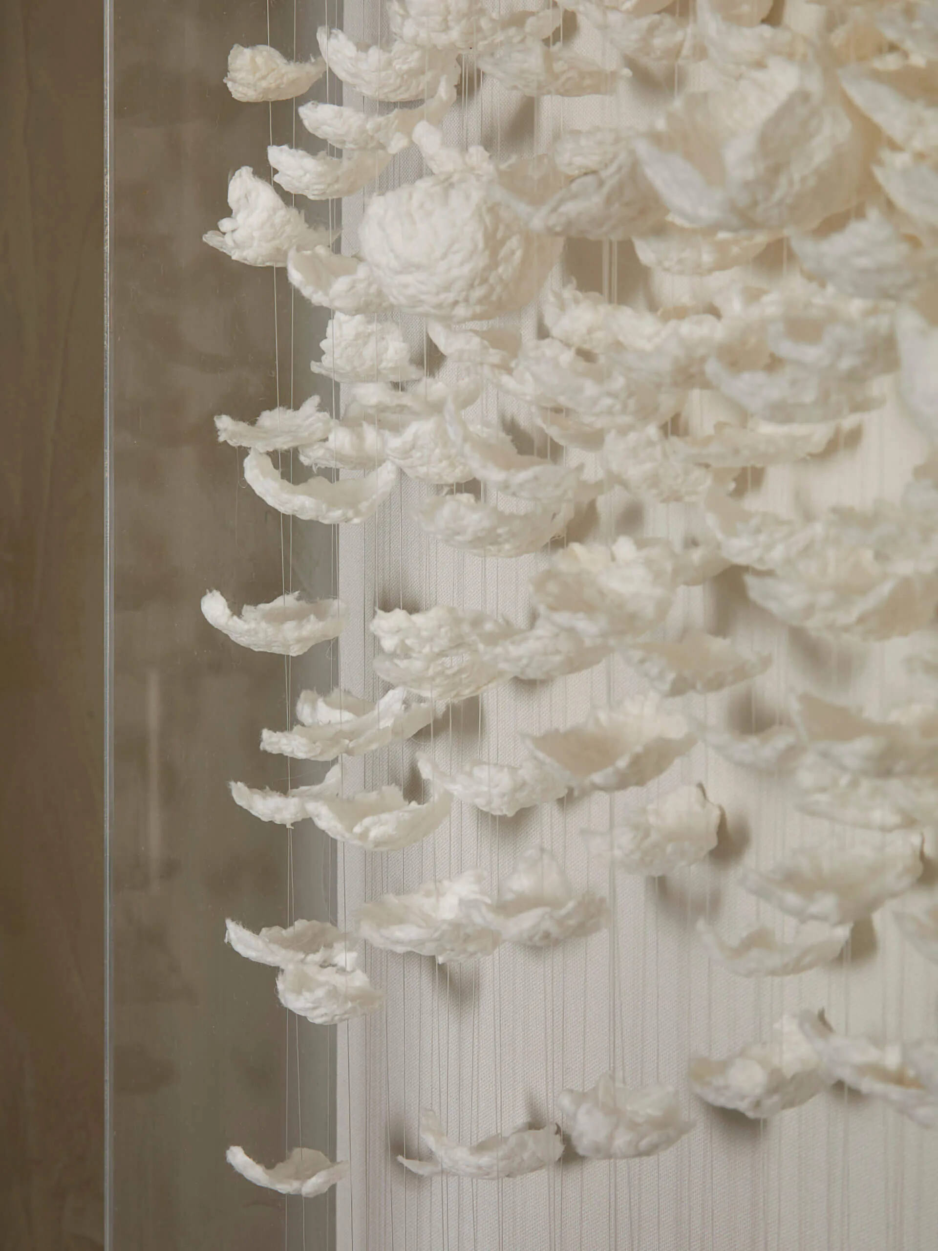 Paper Petals 3D Art - 1 — Beautifully shaped by hand these brilliant white petals are carefully arranged on strings to form…