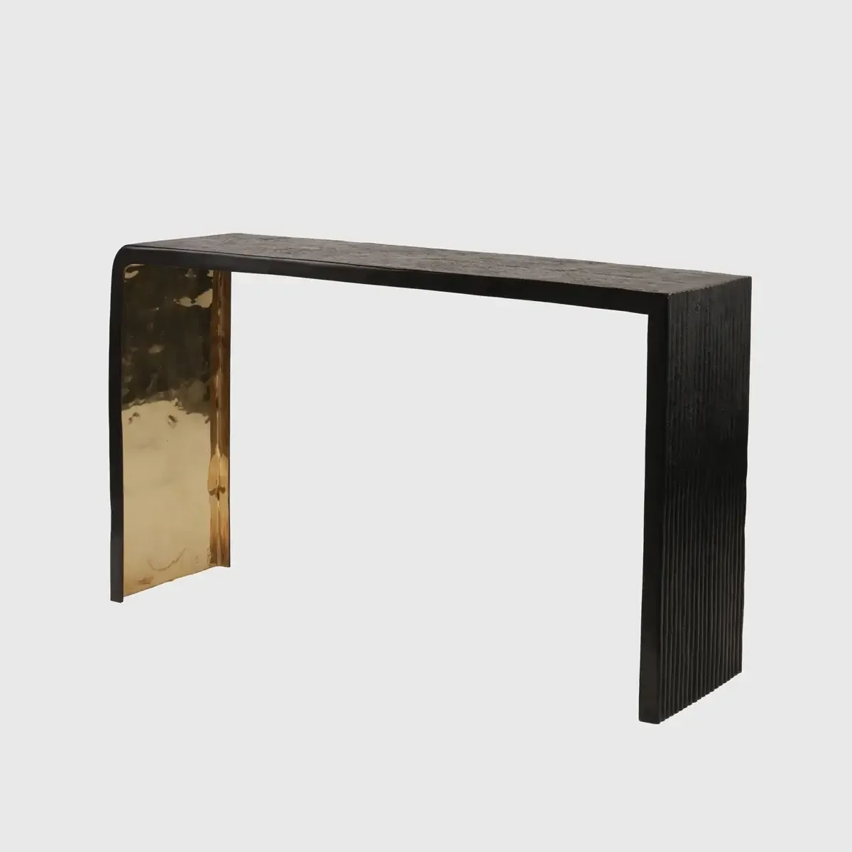 Ribbed Bronze Console — More than a surface, it is a bronze statement piece designed to define an entrance hall, hallway…