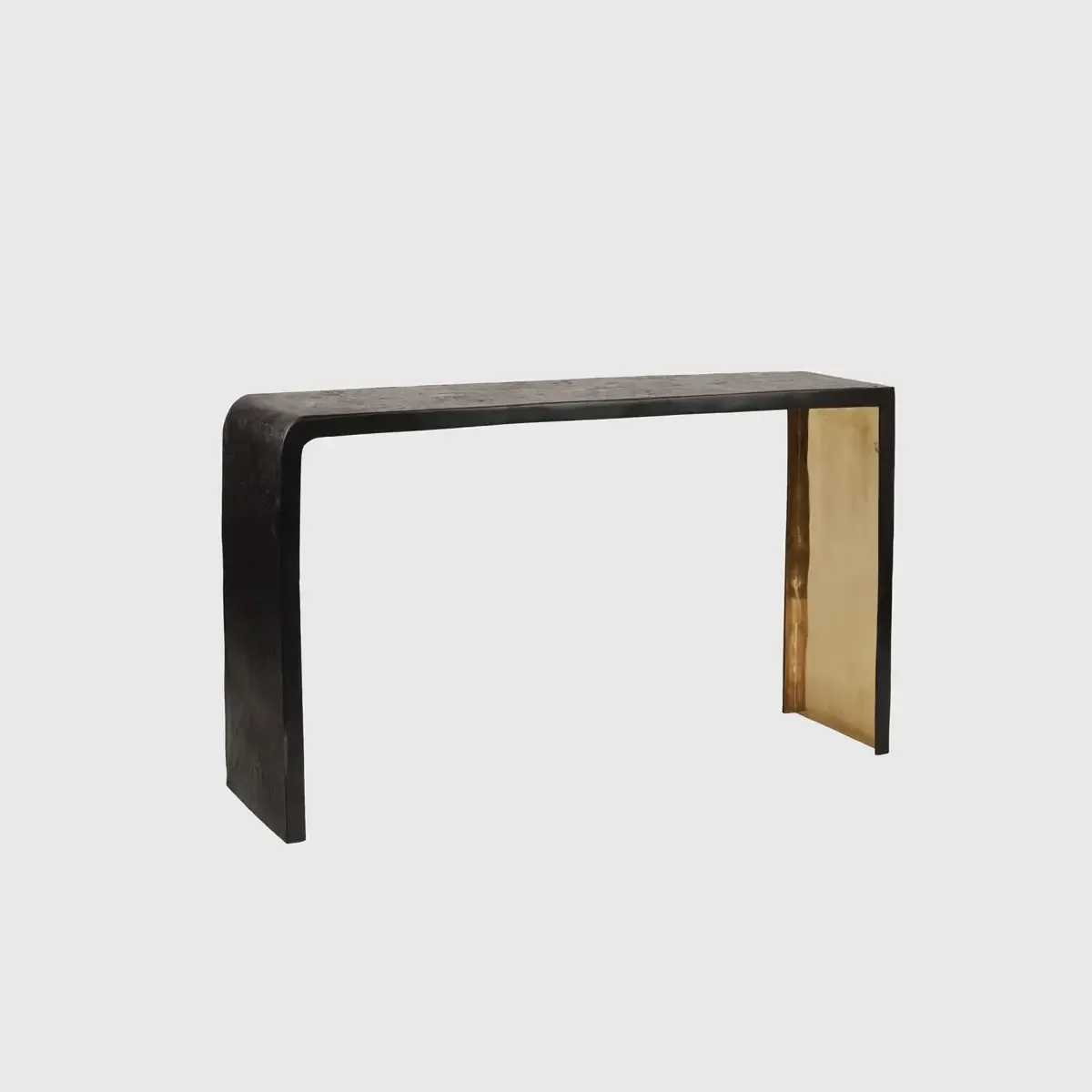Ribbed Bronze Console — The design combines a dark ribbed exterior with a polished gold-toned interior, creating a…