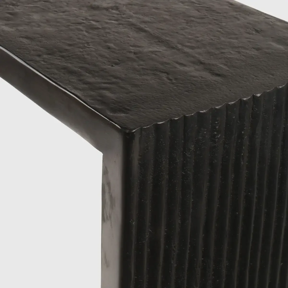 Ribbed Bronze Console — Handcast in bronze, the Ribbed Bronze Console demonstrates the tactile quality and surface…