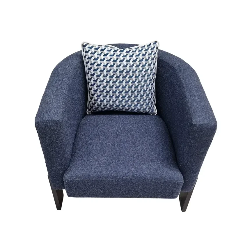 Stamford Chair — You can use this eye-catching, contemporary three-legged armchair as a standout focal point in your home.