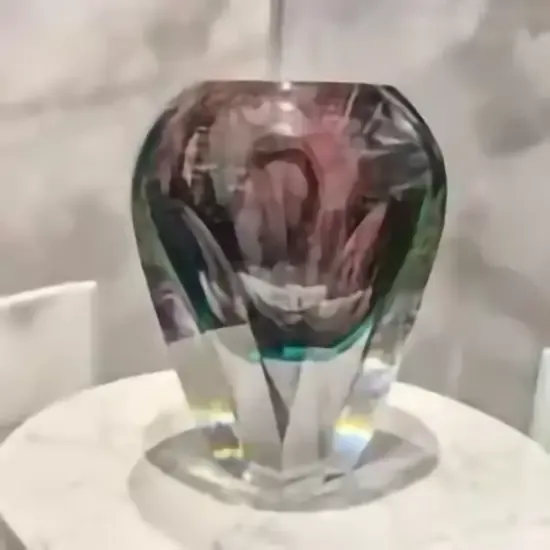 Studio art glass MAY32562 — Displayed on a console, tabletop, or shelving unit, its ethereal form and radiant surface…